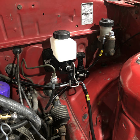 Chase Bays 85-92 Mazda RX-7 FC Single Piston Brake Booster Delete Brake Line Relocation