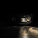 AlphaRex 02-05 Dodge Ram 1500 PRO-Series Projector Headlights Plank Style Black w/Seq Signal-4