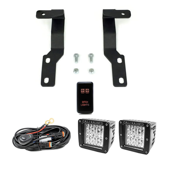 Cali Raised 05-15 Toyota Tacoma Low Prof Ditch Light Brackets Kit W/ Amber Backlight - Tall