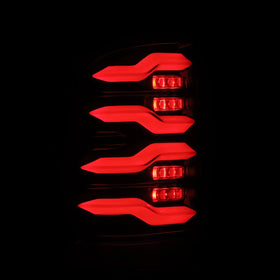 AlphaRex 09-18 Dodge Ram Luxx-Series LED Tail Lights Alpha-Black w/ Activation Light & Seq. Signal - 0