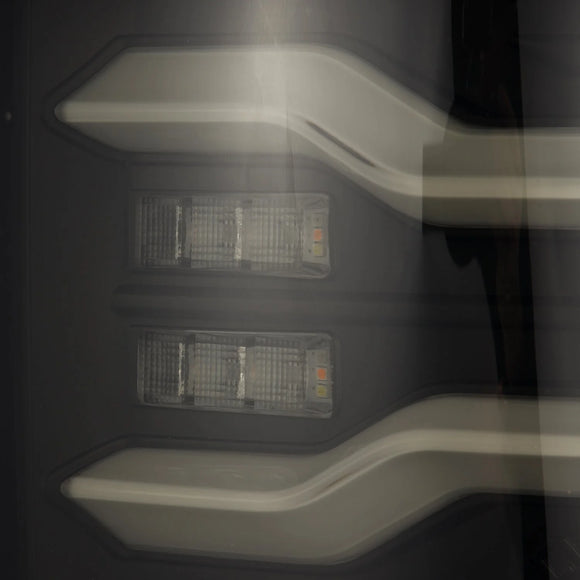AlphaRex 09-18 Dodge Ram Luxx-Series LED Tail Lights Black w/ Activation Light & Sequential Signal