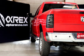 AlphaRex 09-18 Dodge Ram Luxx-Series LED Tail Lights Black w/ Activation Light & Sequential Signal - 0