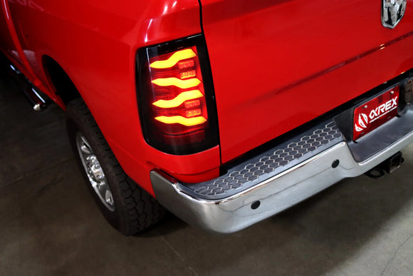 AlphaRex 09-18 Dodge Ram Luxx-Series LED Tail Lights Black w/ Activation Light & Sequential Signal
