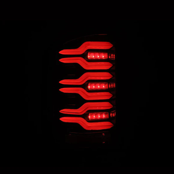 AlphaRex 14-18 GMC Sierra 1500/2500HD/3500HD LUXX-Series LED Tail Lights Alpha-Blk Actv Lgt Seq. Sig