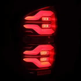 AlphaRex 16-21 Toyota Tacoma LUXX LED Taillights Blk w/Activ Light/Seq Signal - 0