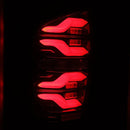 AlphaRex 16-21 Toyota Tacoma LUXX LED Taillights Blk/Red w/Activ Light/Seq Signal-2
