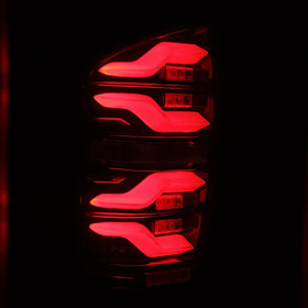 AlphaRex 16-21 Toyota Tacoma LUXX LED Taillights Blk/Red w/Activ Light/Seq Signal - 0