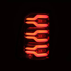 AlphaRex 19-21 Dodge Ram 1500 Luxx-Series LED Tail Lights Alpha-Black w/Activ Light/Seq Signal - 0