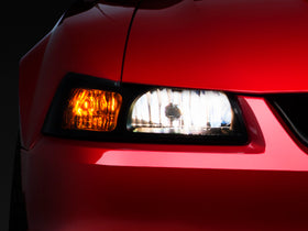 Raxiom 99-04 Ford Mustang Axial Series OE Style Headlights- Black Housing (Smoked Lens) - 0