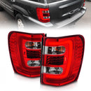 ANZO 1999-2004 Jeep Grand Cherokee LED Tail Lights w/ Light Bar Chrome Housing Red/Clear Lens-1