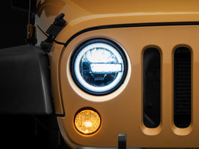 Raxiom 97-18 Jeep Wrangler TJ/JK 7-Inch LED Headlights w/ Halos- Black Housing (Clear Lens) - 0