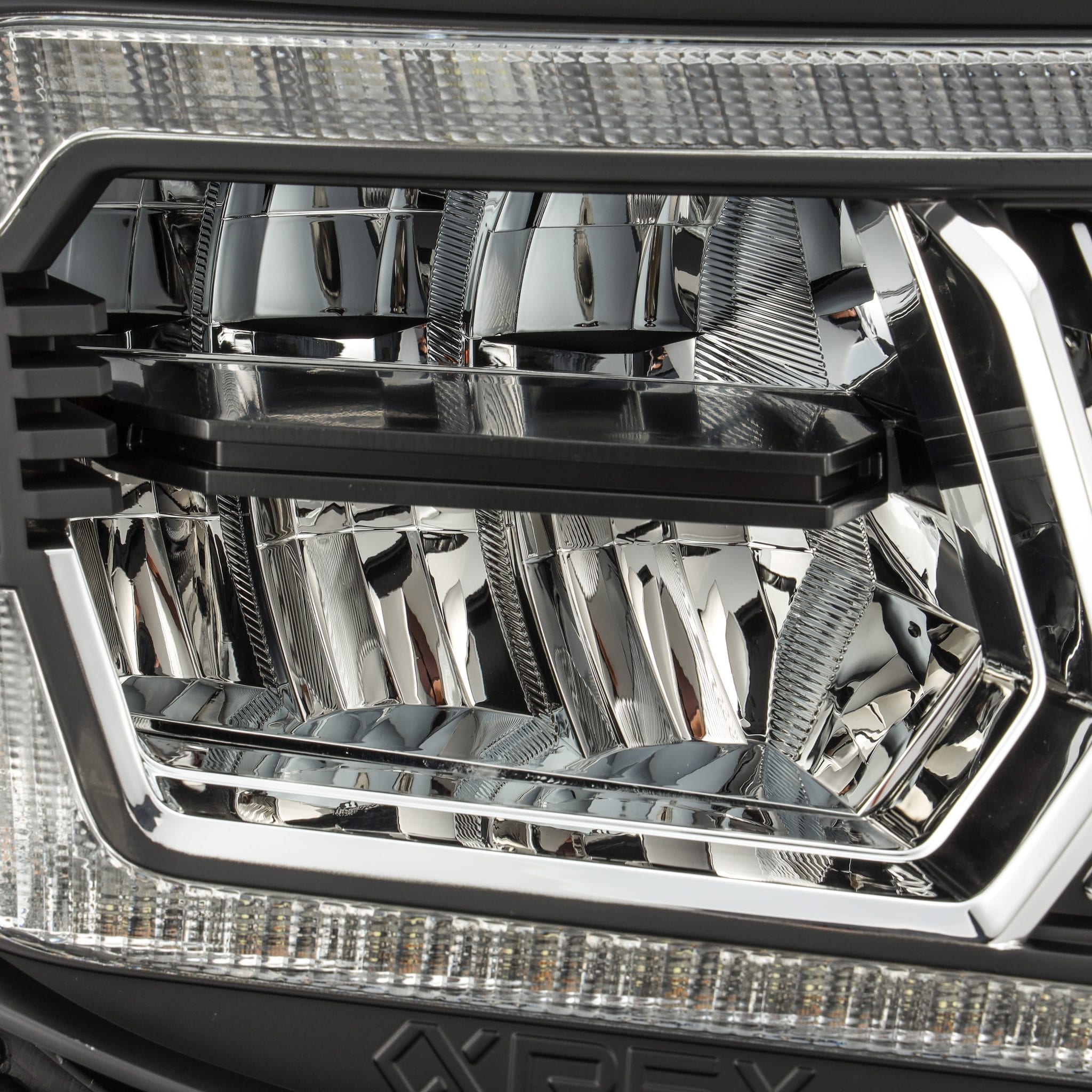 AlphaRex 05-11 Toyota Tacoma LUXX Crystal Headlights Plank Style Design Black w/Activation Light/DRL - 0