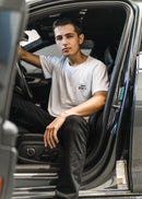 Model wearing pizzabrand white BMW 2002 Turbo t-shirt in white.