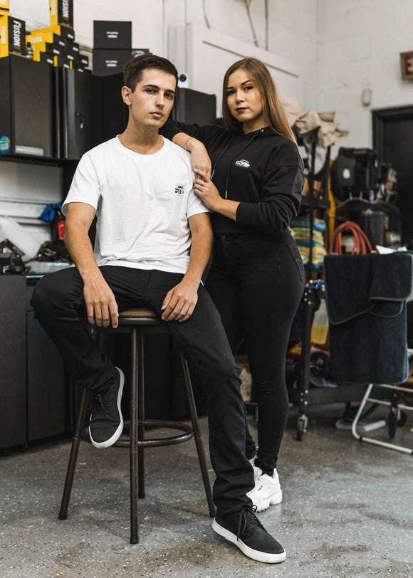 Model wearing pizzabrand white BMW 2002 Turbo cropped hoodie in black.