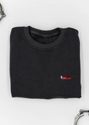 A dark grey BMW/Bimmer E30 M3 crewneck sweater for men. Photo is a front view of the sweater with an embroidered red BMW E30 M3 doing a burnout. Fabric is 100% cotton and high quality and fits to size. The style is long sleeve, crew neck, and embroidery on left chest.