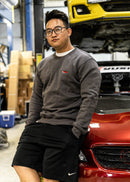 Model wearing pizzabrand BMW E30 M3 crewneck sweater