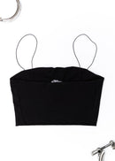 A black Audi crop top for women. Photo is a back view of the shirt with an embroidered Black Audi D2 S8. Fabric composition is 100% polyester. The material is very soft, comfortable, non-transparent. The style of this shirt is sleeveless, spaghetti straps, with a straight neckline.