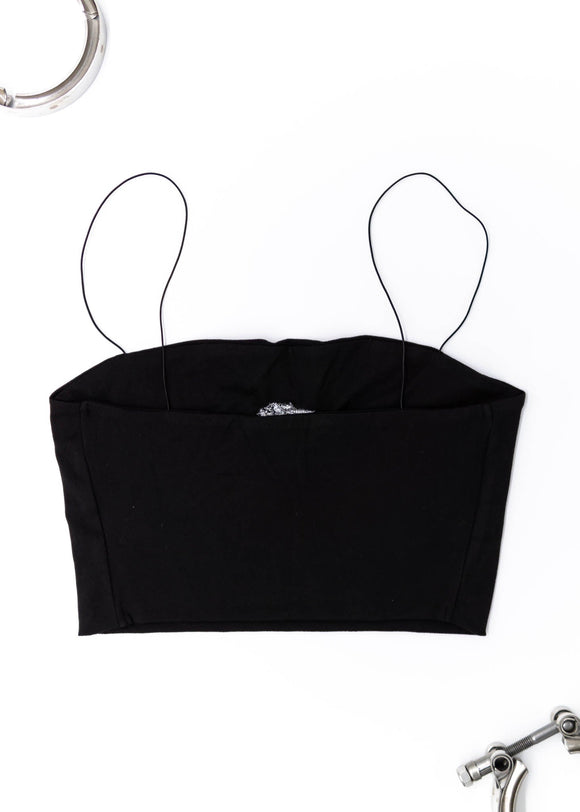 A black Audi crop top for women. Photo is a back view of the shirt with an embroidered Black Audi D2 S8. Fabric composition is 100% polyester. The material is very soft, comfortable, non-transparent. The style of this shirt is sleeveless, spaghetti straps, with a straight neckline.