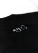 A black Audi crop top for women. Photo is a close up view of the shirt with an embroidered Black Audi D2 S8. Fabric composition is 100% polyester. The material is very soft, comfortable, non-transparent. The style of this shirt is sleeveless, spaghetti straps, with a straight neckline.