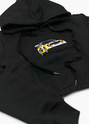 A black Audi cropped hoodie for women. Photo is a front view of the cropped sweater with an embroidered Sport Quattro S1 E2. Fabric composition is cotton, and polyester. The material is soft, stretchy, and non-transparent. The style of this crop hoodie is long sleeve, crewneck with a hood, hooded, with embroidery on the chest.