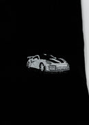 Close up of an embroidered 991.2 GT2 RS on a women's high quality cropped t-shirt. Photo shows the detailed embroidery of a white, silver, and carbon fiber GT2 RS. Fabric composition of this tee is 100% cotton. The material is very soft, stretchy, and non-transparent. The style of this tshirt is a crewneck, short sleeve, cropped at the waist, with embroidery on the left chest.