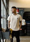 Model wearing pizzabrand black W201 190E Evo II t-shirt in khaki.