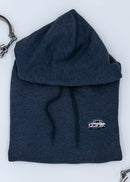 A dark blue BMW unisex hoodie for men and women. Photo is a close up view of the sweater with an embroidered BMW 2002 Turbo. Fabric composition is cotton, polyester, and rayon. The material is very soft, stretchy, and non-transparent. The style of this hoodie is long sleeve, crewneck with a hood, hooded, with embroidery on the left chest.