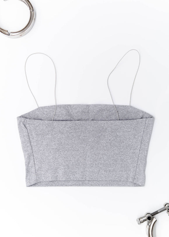 A grey Audi crop top for women. Photo is a back view of the shirt with an embroidered Black Audi D2 S8. Fabric composition is 100% polyester. The material is very soft, comfortable, non-transparent. The style of this shirt is sleeveless, spaghetti straps, with a straight neckline.