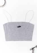 A grey Audi crop top for women. Photo is a front view of the shirt with an embroidered Black Audi D2 S8. Fabric composition is 100% polyester. The material is very soft, comfortable, non-transparent. The style of this shirt is sleeveless, spaghetti straps, with a straight neckline.