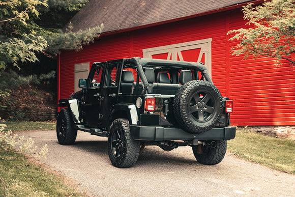 Corsa 07-18 Jeep Wrangler JKU 3.6L/3.8L 2.75in Sport Cat-Back Exhaust w/ 4in American Flag BlacTips