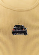 A khaki Audi crop top for women. Photo is a close up view of the top with an embroidered black Audi B5 RS4. Fabric composition is polyester, and elastine. The material is stretchy, ribbed, and non-transparent. The style of this shirt is sleeveless, with a crewneck neckline.