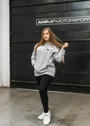 Model wearing pizzabrand black Mercedes-Benz W201 190E Evo II hoodie in grey.