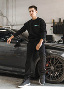 Model wearing Park Auto Motorsports crewneck in black.