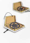 A pizzabrand pizza box with wheels multipack sampler pack air fresheners. Photo is a close up of the Porsche Lobster Claw wheel air freshener with string. 