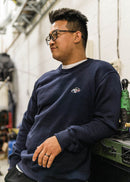 Model wearing pizzabrand Porsche 911 Carrera RSR crewneck sweater