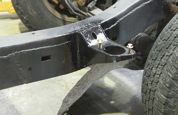 Rust Buster 1996-2002 Toyota 4 Runner Front Body Frame Mount Bracket - Left
