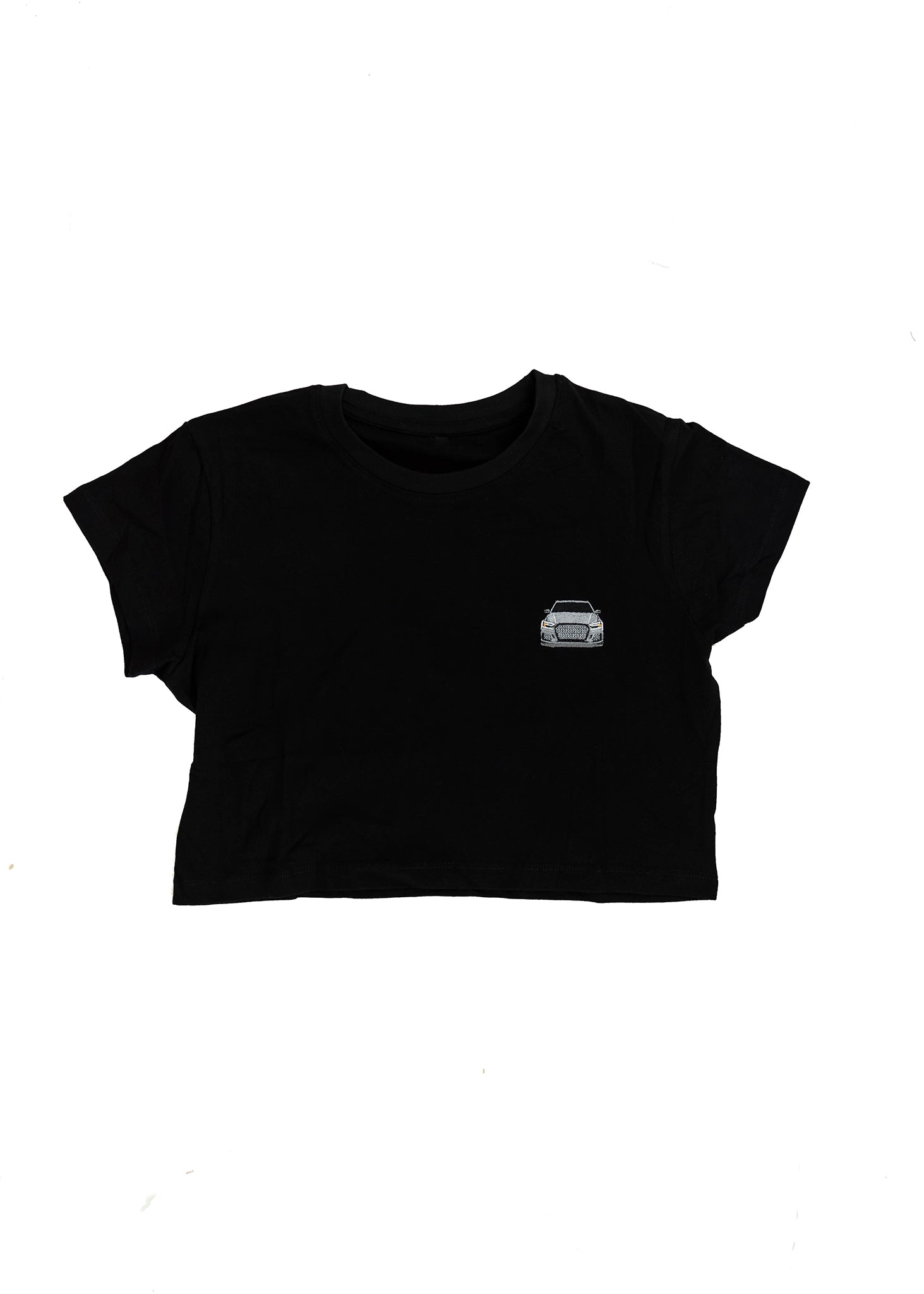 A black women's high quality cropped t-shirt. Full size front view of the black shirt with a nardo grey embroidered 8V RS3. Fabric composition of this tee is 100% cotton. The material is very soft, stretchy, and non-transparent. The style of this tshirt is a crewneck, short sleeve, cropped at the waist, with embroidery on the left chest.