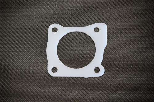 Torque Solution Thermal Throttle Body Gasket: DSM Eclipse / Talon / Laser 1st Gen 4G63 Turbo Only