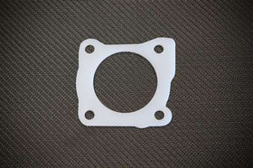 Torque Solution Thermal Throttle Body Gasket: DSM Eclipse / Talon / Laser 1st Gen 4G63 Turbo Only