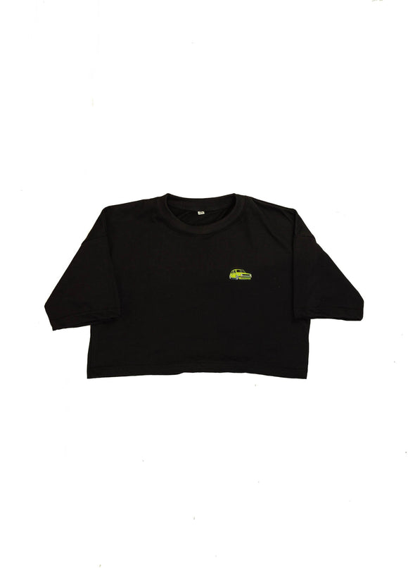 A black cropped t-shirt for VW women and plus size women. Front view of a 100% cotton crop tee with an embroidered VW Mk1 Golf. The material is stretchy, and non-transparent with a crewneck neckline and short sleeves.