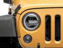 Raxiom 97-18 Jeep Wrangler TJ/JK 7-Inch LED Headlights w/ Halos- Black Housing (Clear Lens)-1