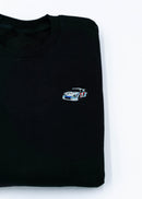 A black 911 RSR 2.1 Turbo crewneck sweater for men. Photo is a close up of the sweater with an embroidered 911 RSR 2.1 Turbo. Fabric is a cotton and polyester mix and high quality and fits to size. The style is long sleeve, crew neck, and embroidery on left chest.