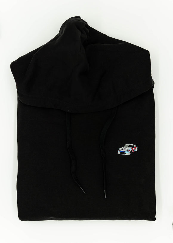 A black 911 RSR racing unisex hoodie for men and women. Photo is a close up view of the sweater with an embroidered Martini R13 911 RSR 2.1 Turbo. Fabric composition is cotton, polyester, and rayon. The material is very soft, stretchy, and non-transparent. The style of this hoodie is long sleeve, crewneck with a hood, hooded, with embroidery on the left chest.