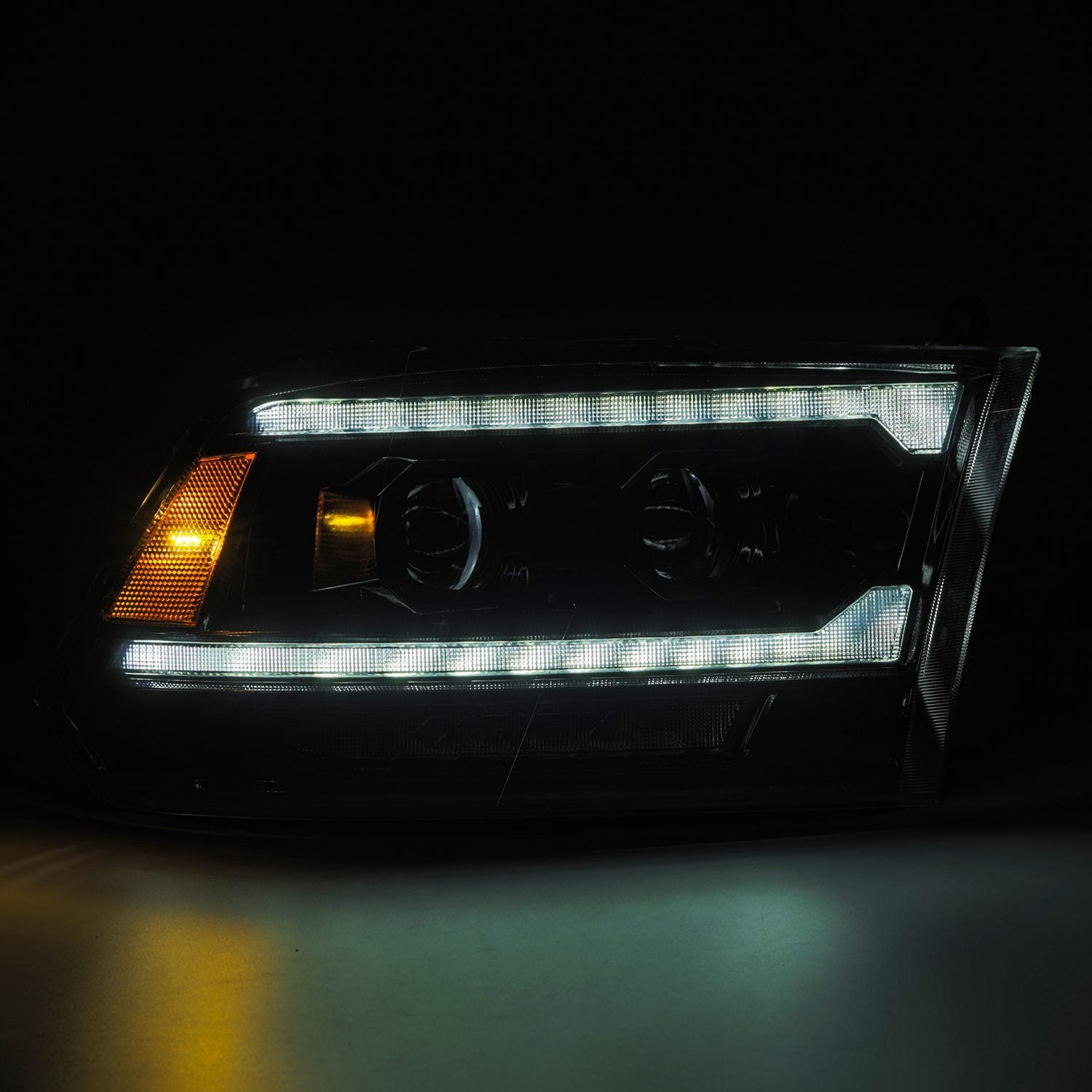 AlphaRex 09-18 Ram 2500 LUXX LED Proj Headlight Plank Style Alpha Blk w/Activ Light/Seq Signal/DRL