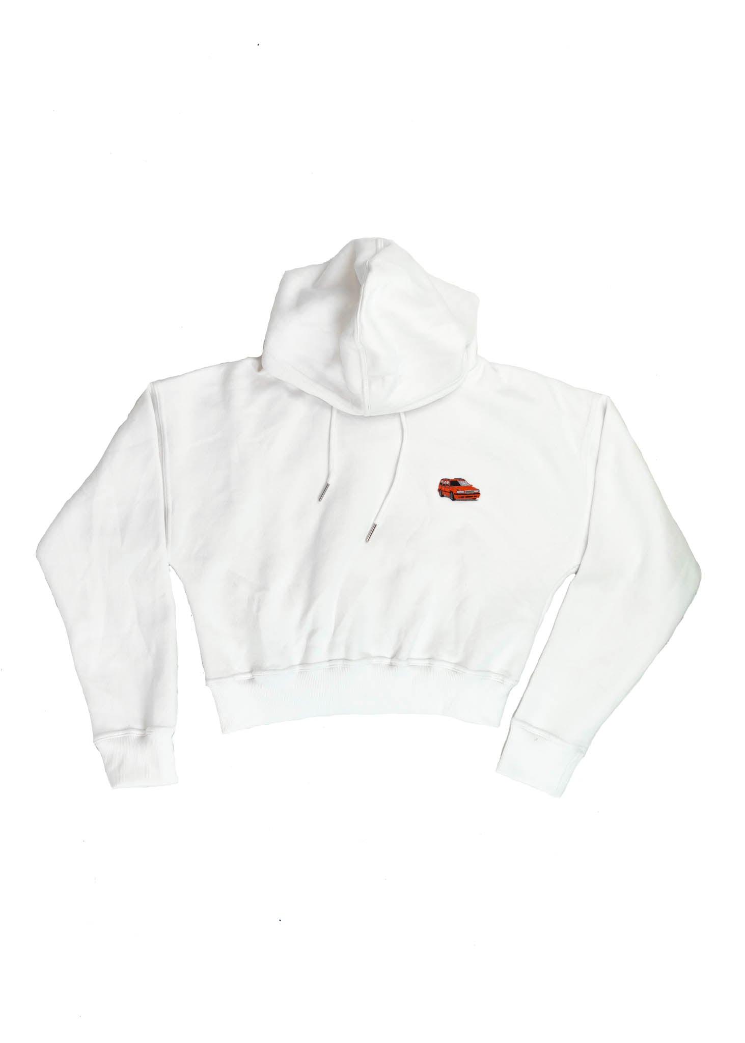 A white Volvo cropped hoodie for women. Photo is a front view of the cropped sweater with an embroidered 850R. Fabric composition is 100% cotton. The material is soft, comfortable, breathable, and non-transparent. The style of this crop hoodie is long sleeve, crewneck with a hood, hooded, with embroidery on the chest.