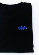 A black Mk4 Golf R32 T-Shirt for men. Photo is a close up view of the shirt with an embroidered blue Mk4 Golf R32. Fabric composition is 65% polyester, and 35% cotton. The material is very stretchy, soft, comfortable, breathable, and non-transparent. The style of this shirt is short sleeve, with a crewneck neckline.